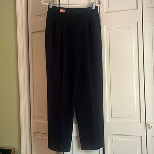 Vintage relaxed, high-waisted wide-leg trousers feature classic front pleats